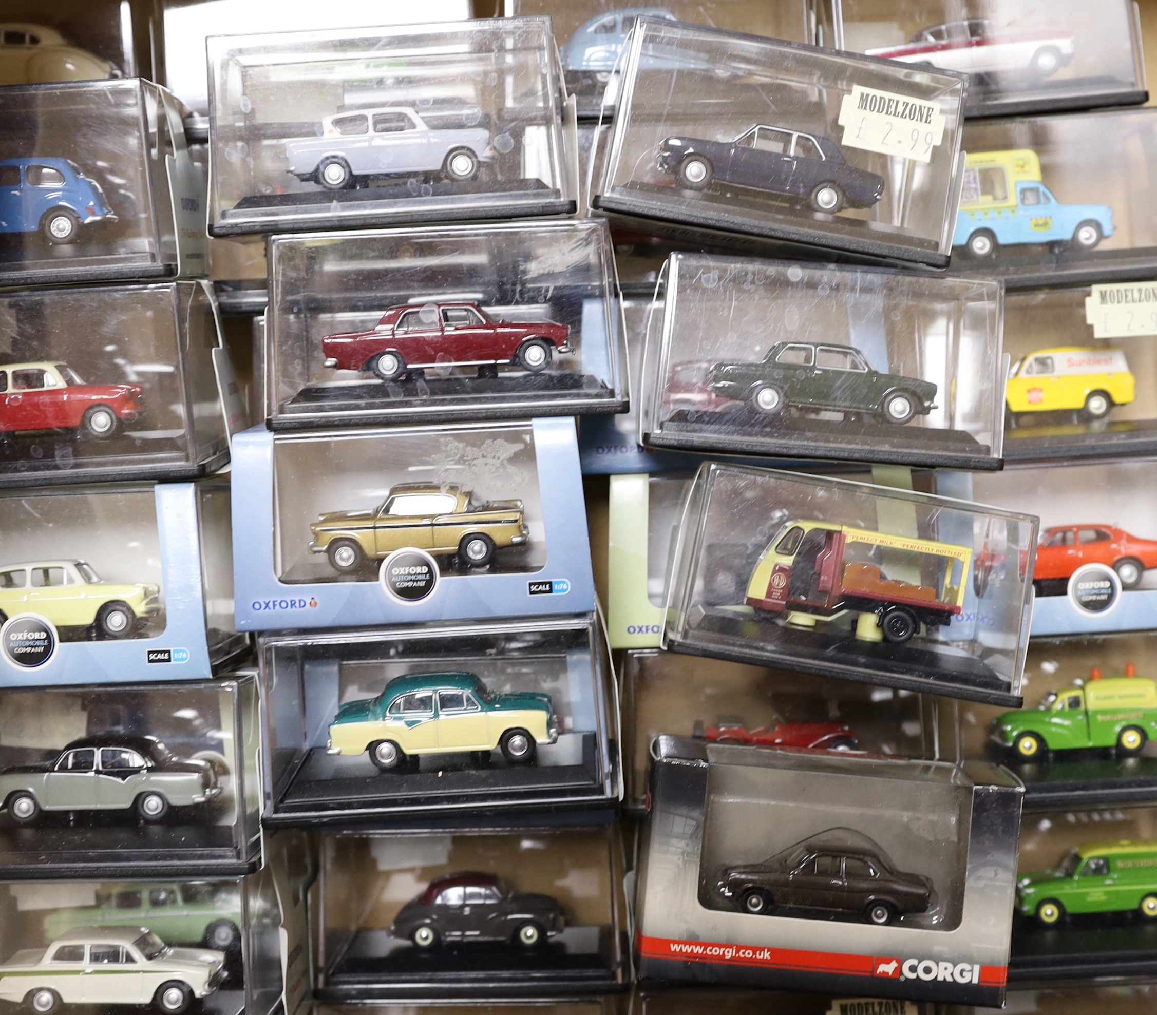 A collection of boxed 00 gauge 1:76 scale vehicles by Oxford Diecast and Corgi, including mainly 1950s/60s/70s cars and light commercial vehicles (54)